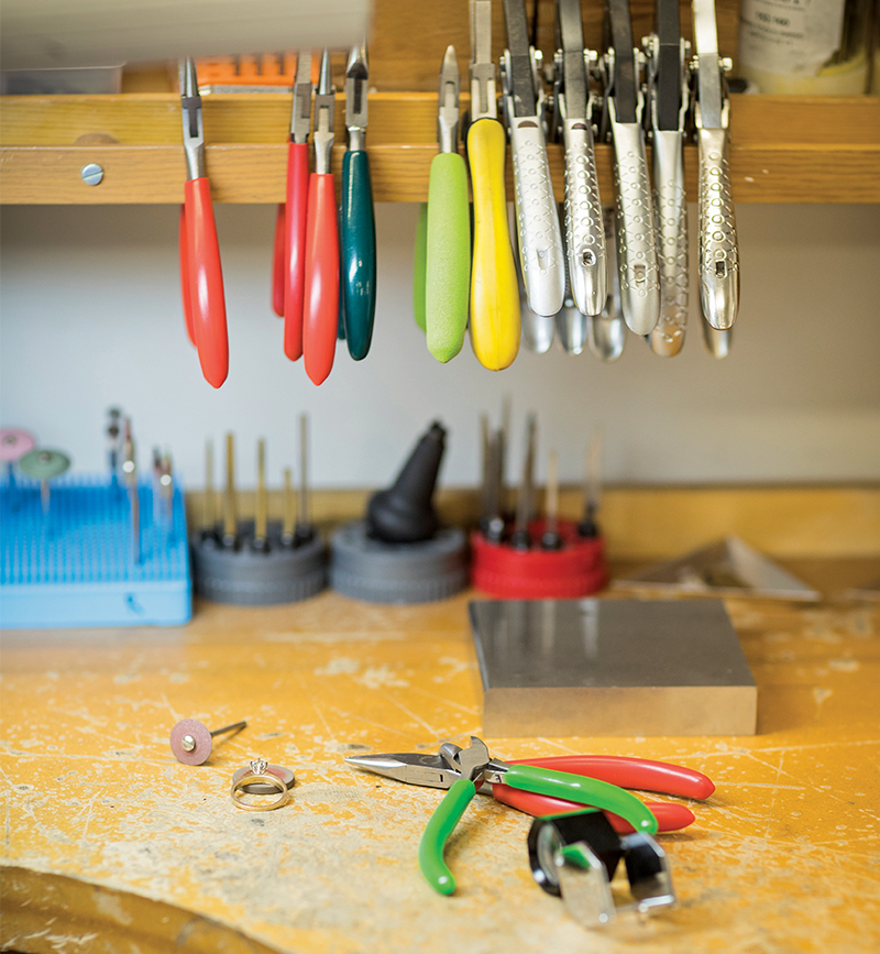 A jewelers bench with tools