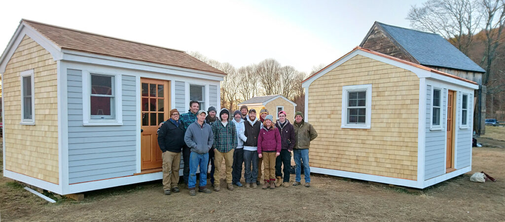 Preservation Carpentry students in front of sheds