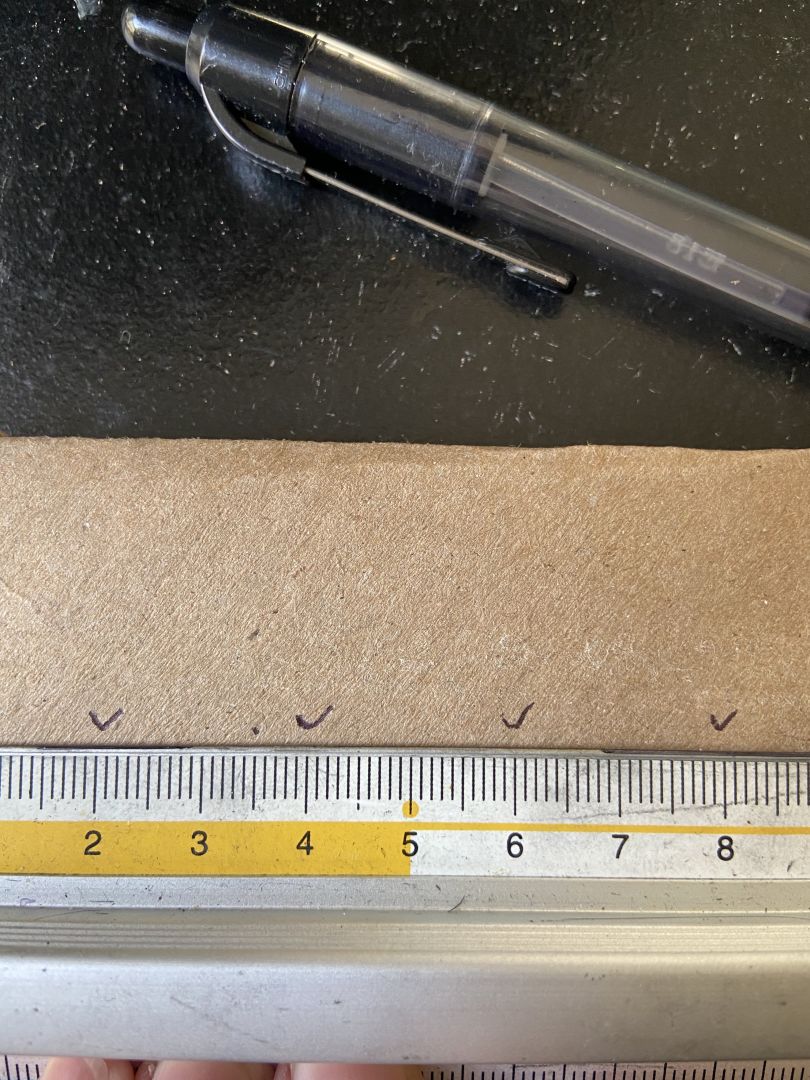 Measuring where to cut the cardboard
