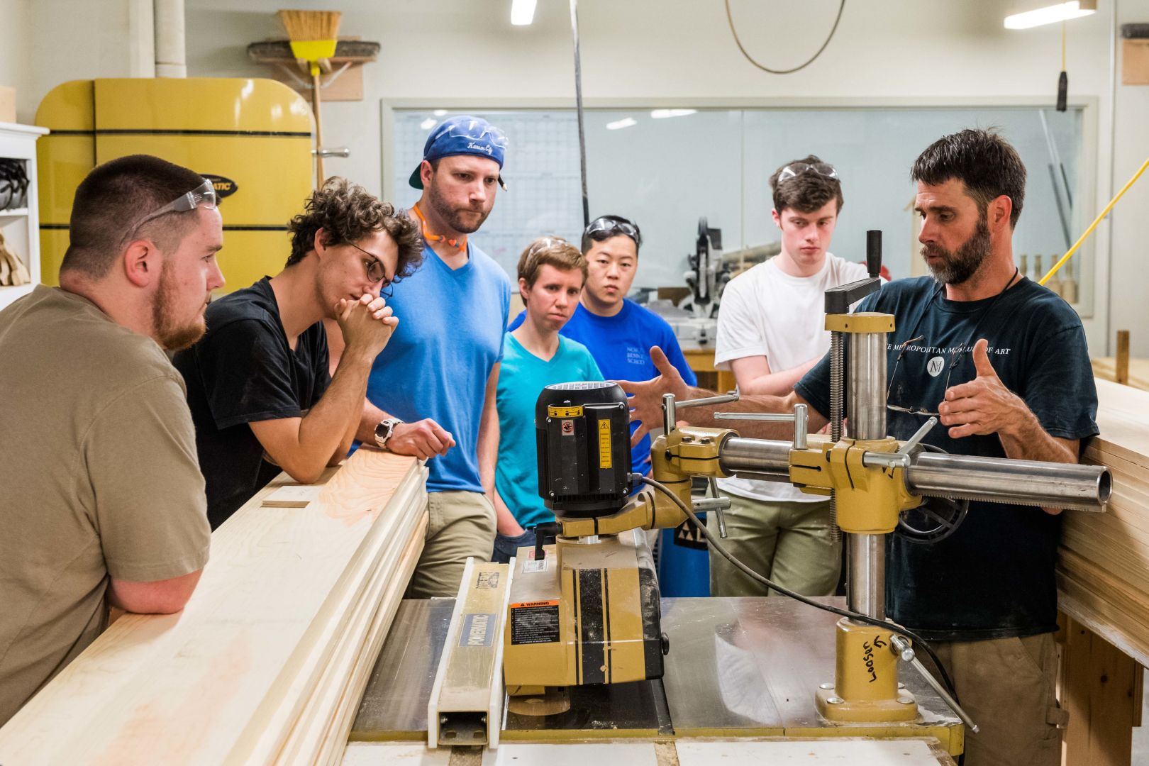 Matt teaching NBSS students in the Carpentry machine room