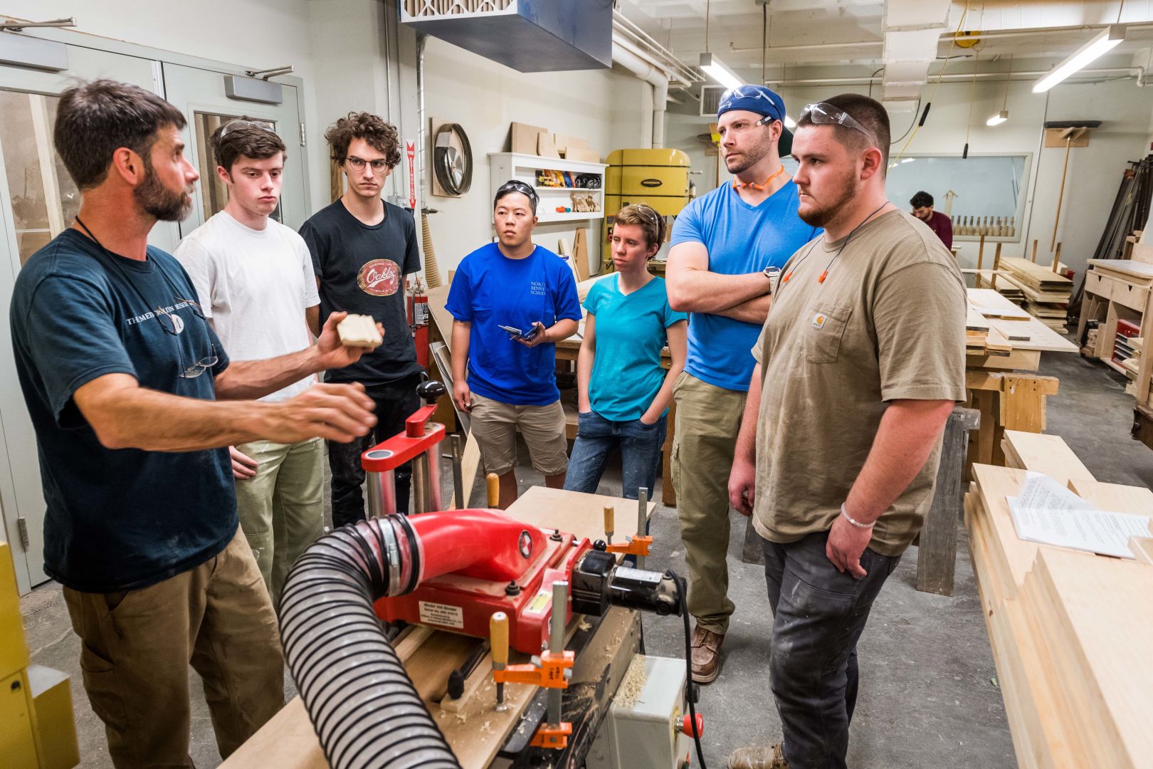 Matt teaching NBSS students in the Carpentry machine room
