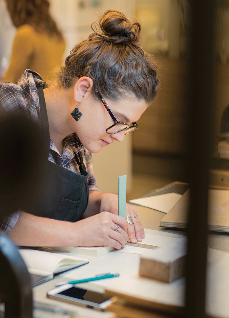 Bookbinding student at work