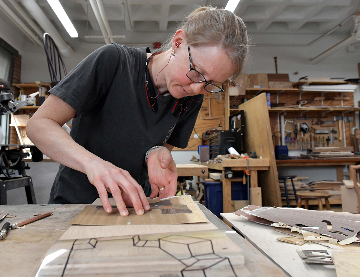 Abbie working on a marquetry inlay