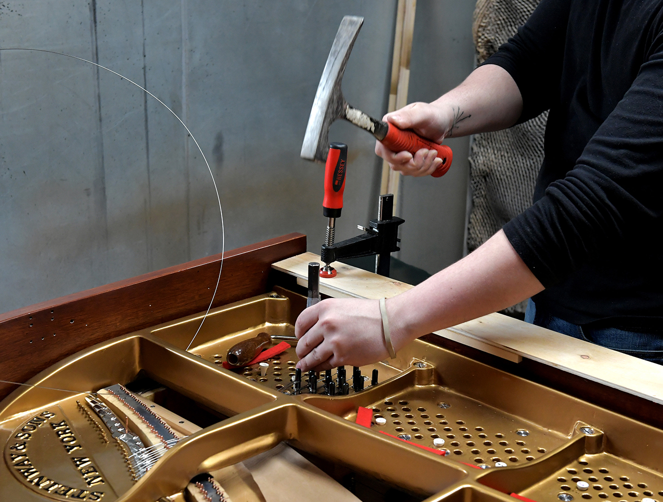 Hammering pins on a piano