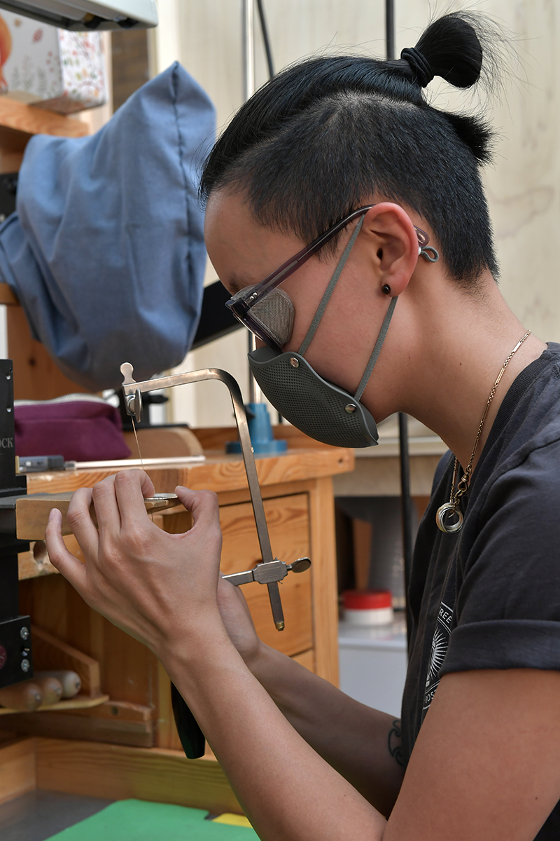 Jewelry making student