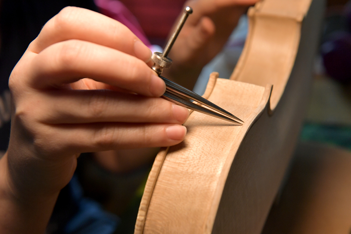 Working on a violin