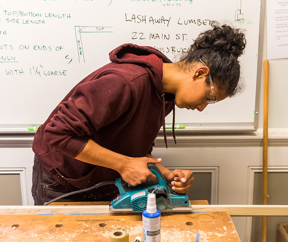 Student cutting trim material