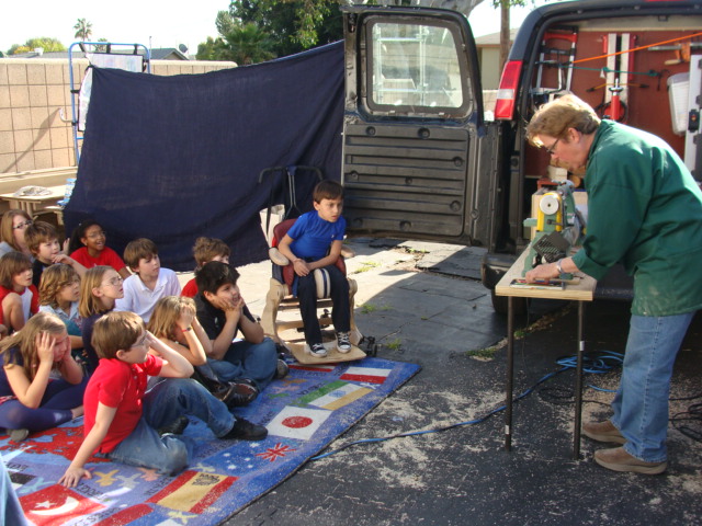 Beth Ireland teaching kids to turn wood