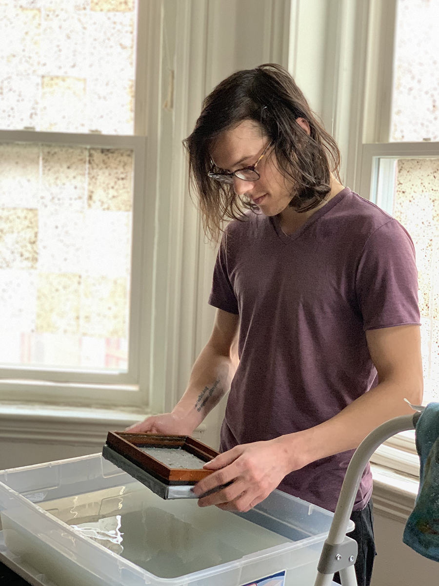 Mitch making paper at home