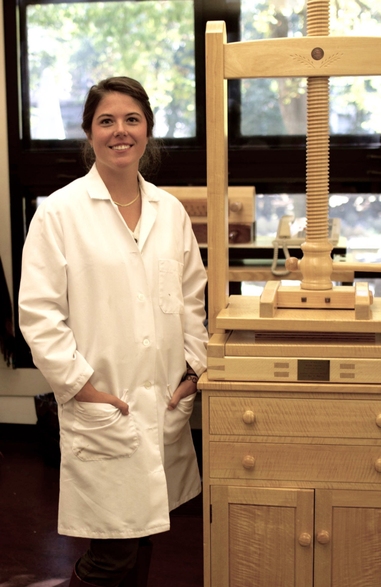 Marianna with a book press