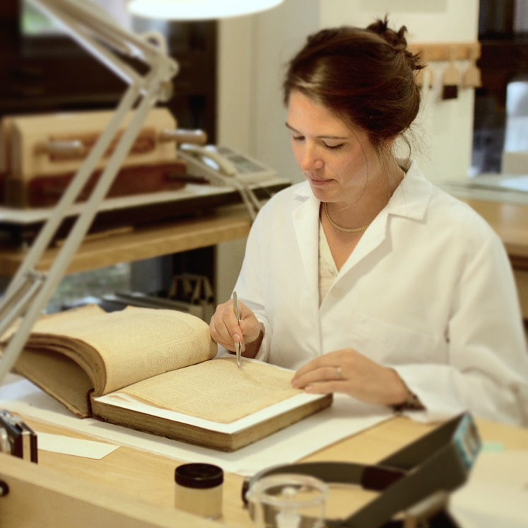 Marianna working on a historic book