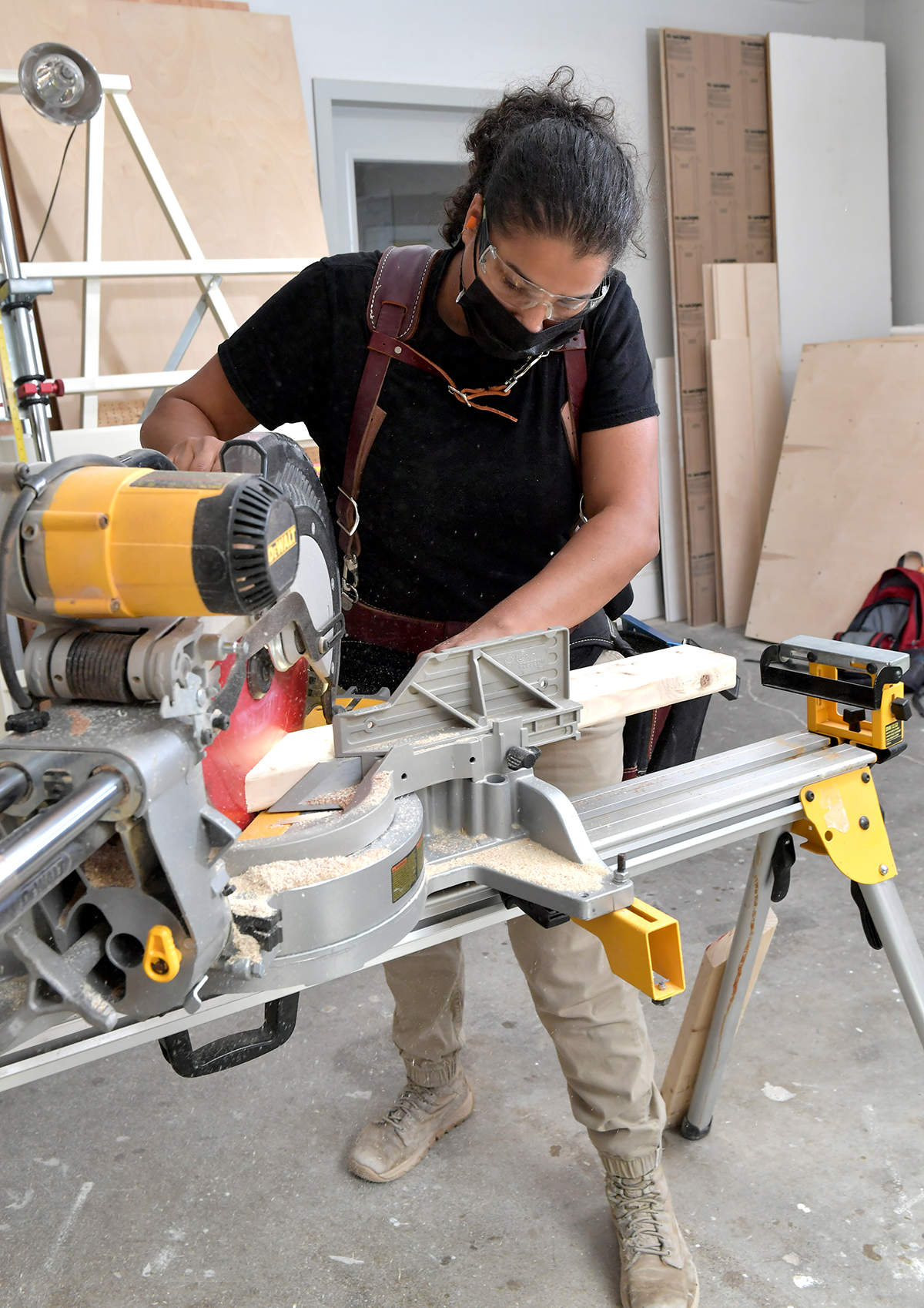 Carpentry student working at the chop saw