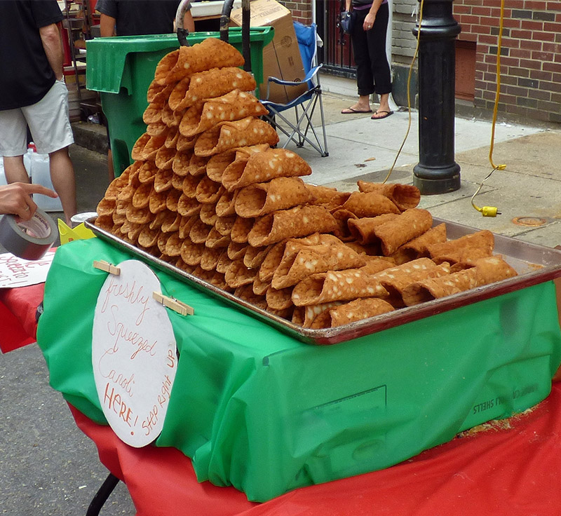 Cannolis galore, image by Fisherman's Feast of the Madonna, image by St. Agrippina di Mineo Feast, image by Lorianne DiSabato / Flickr