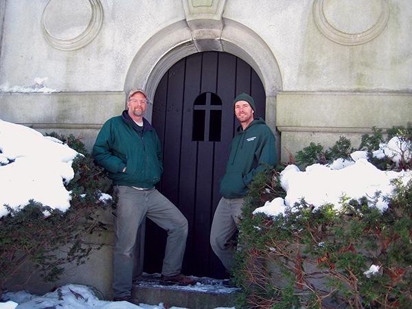 Steve Brown and Greg Ghazil in front of the door