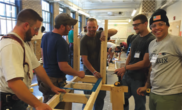 Carpentry students work on their first project