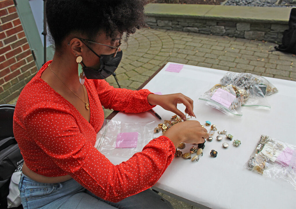 Ja'Hari sorting jewelry donations