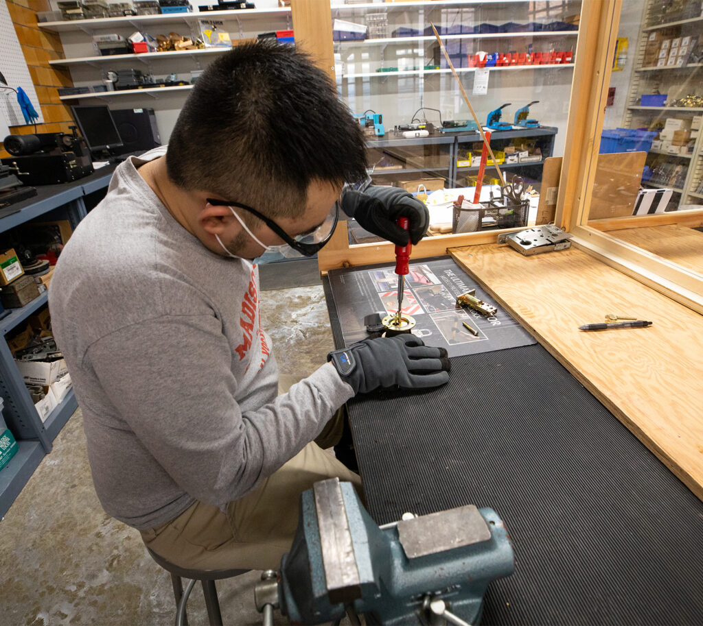 Sonny working on a lock