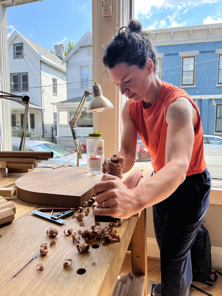 Katrina Tompkins using a handplane in a CMT class. Photo: Aspen Golann.