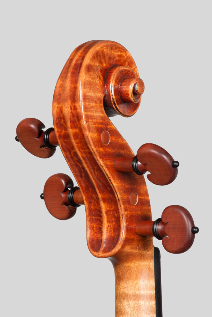 Scroll on Violin by Justin Hess
