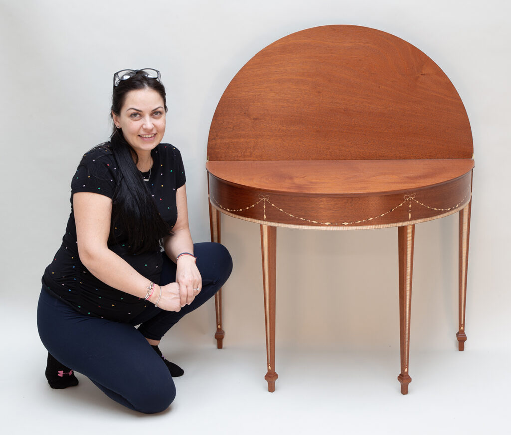 Svetlana next to her card table