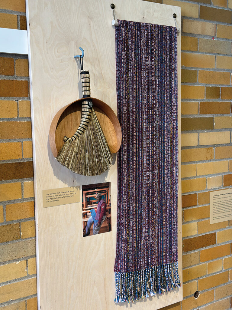 Broom and woven textile made by Berea College student Leeroy Mabvuta