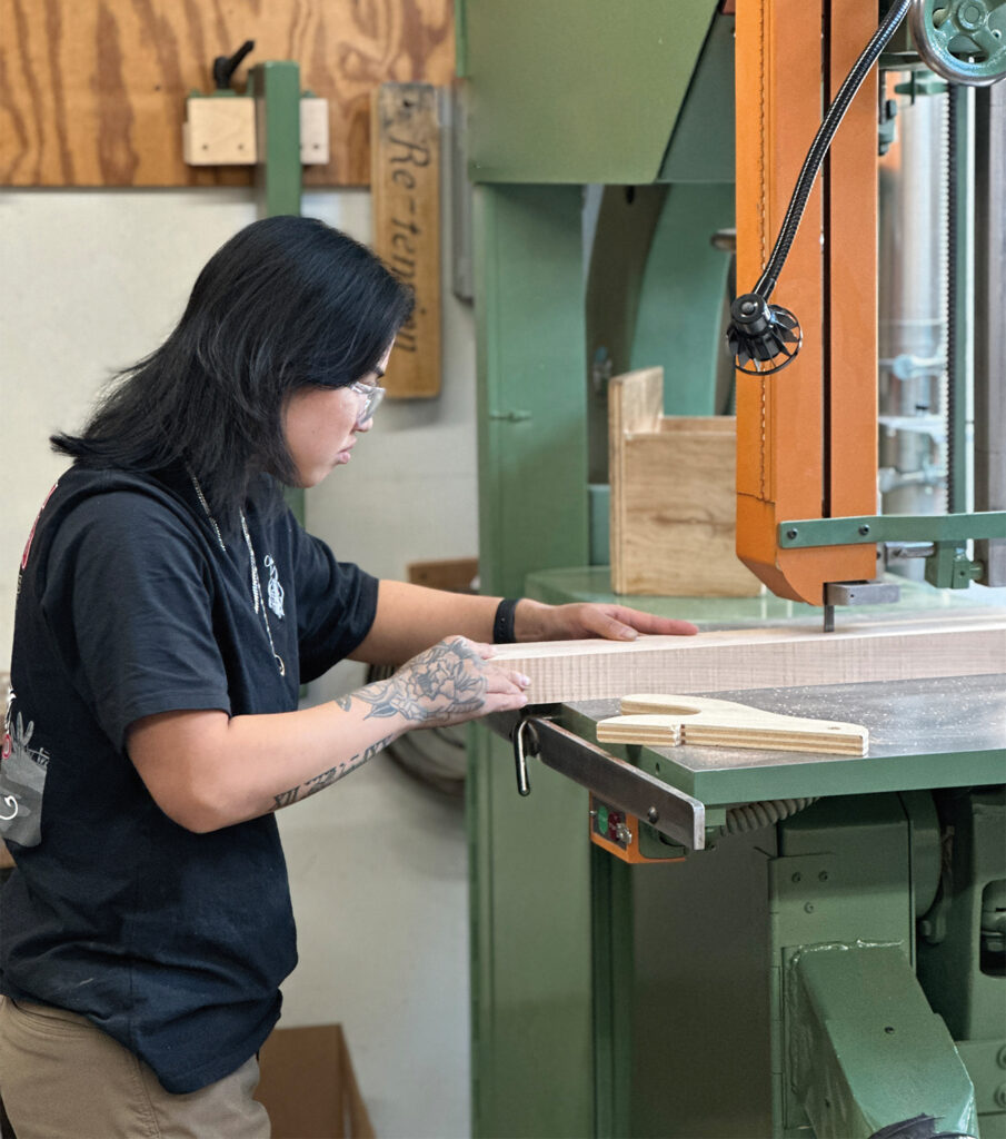 A Cabinet & Furniture Making student uses a Northfield bandsaw