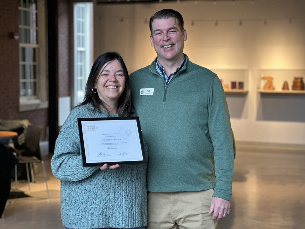 Beth Fitzgerald and Rob O'Dwyer, with a certificate of appreciation