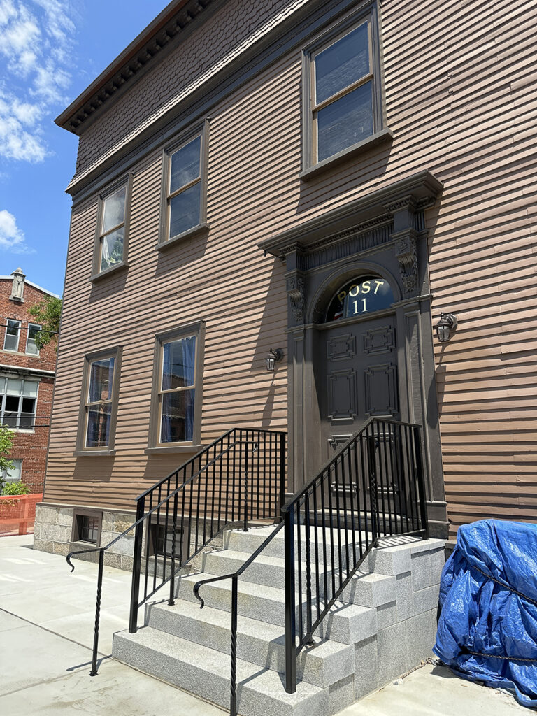 Exterior of the restored building in summer 2024