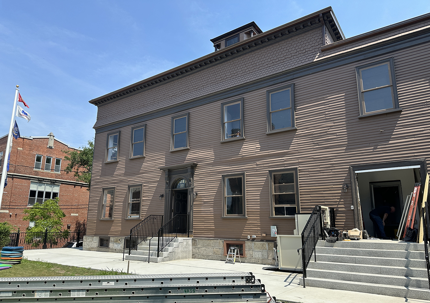 Exterior of the restored building in summer 2024