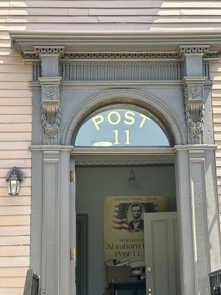 View of the restored architectural details above the front door