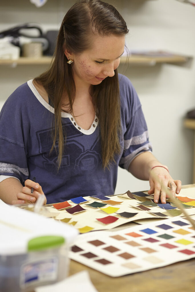 Gabby Cooksey working on color swatches while a student at NBSS