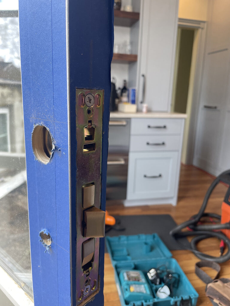 A keyset being installed into a door by Jonathan