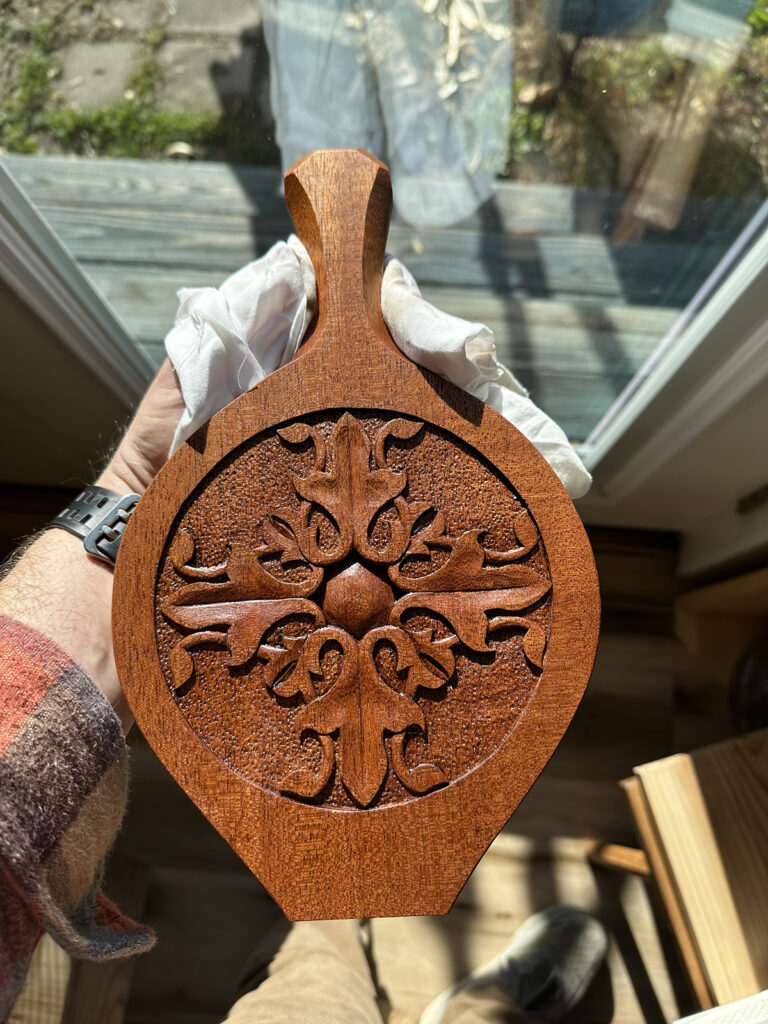 Carved bellows by Brennan Simpson CF ’18