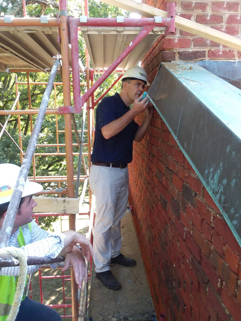 Brian working on a wall project