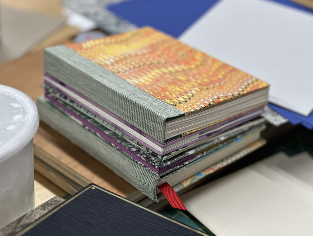 Set of finished books from the Bookbinding Teen Intensive