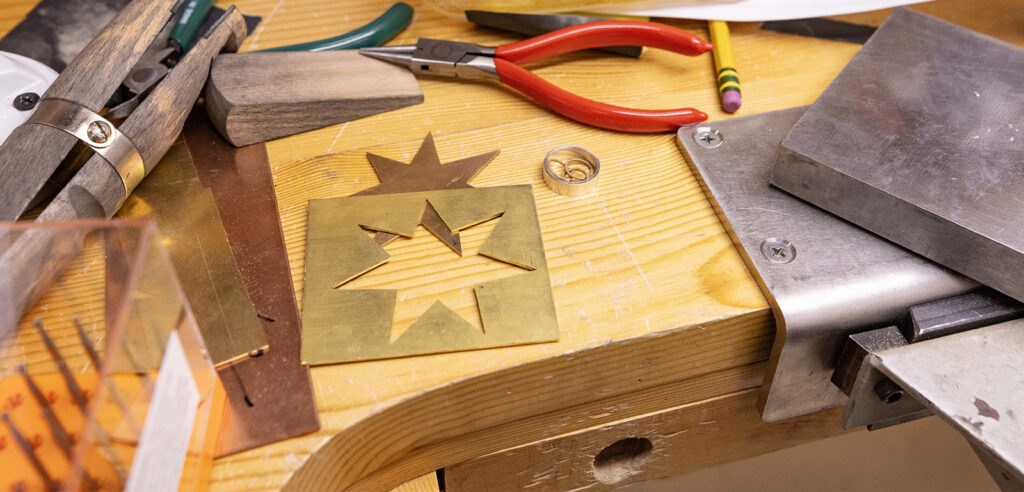 View of a jewelers bench with projects in process