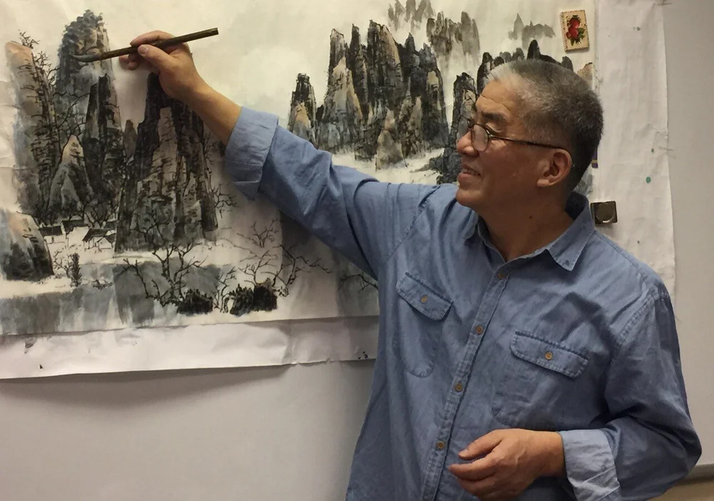 PAO Arts Center instructor Xiaoyong Liu teaching Chinese Brush Painting for Adults.