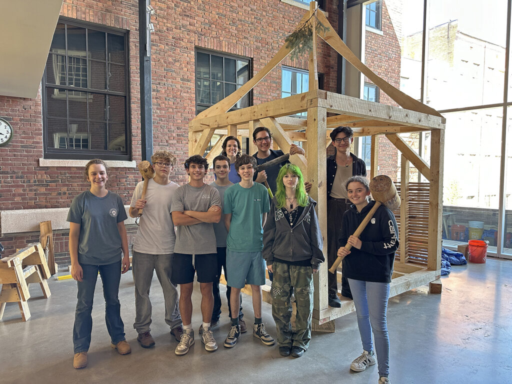 Preservation Carpentry Intensive students with their finished timber frame