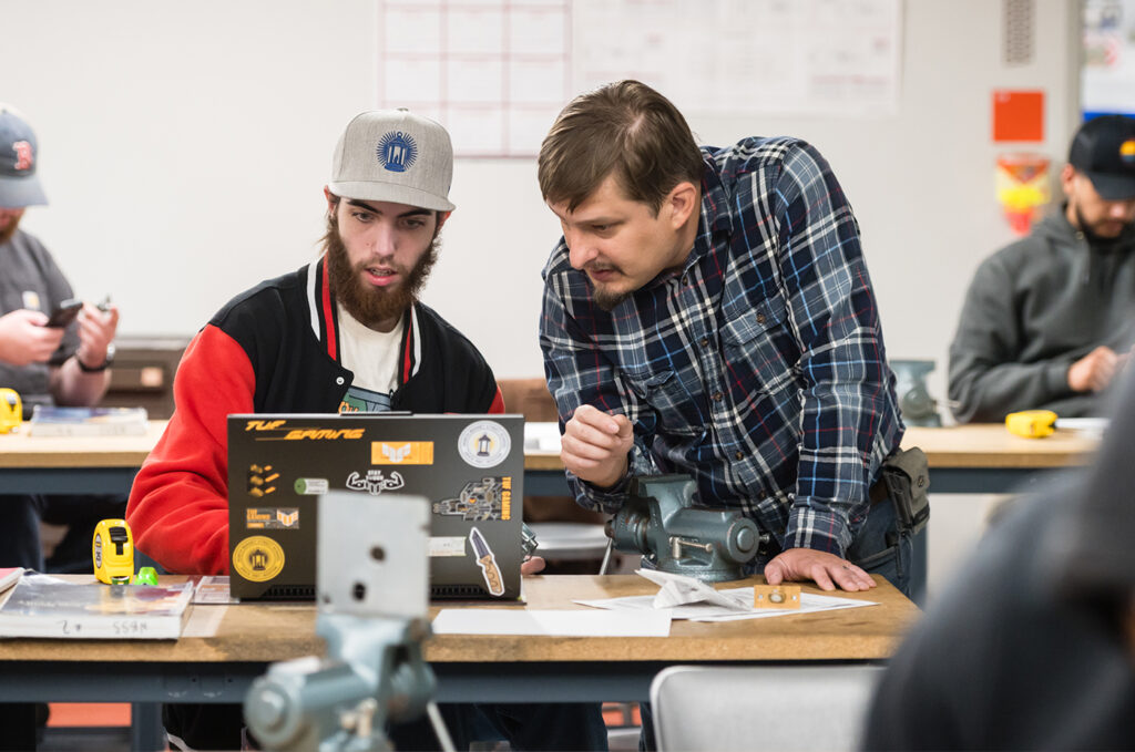 Rick working with a Locksmithing student