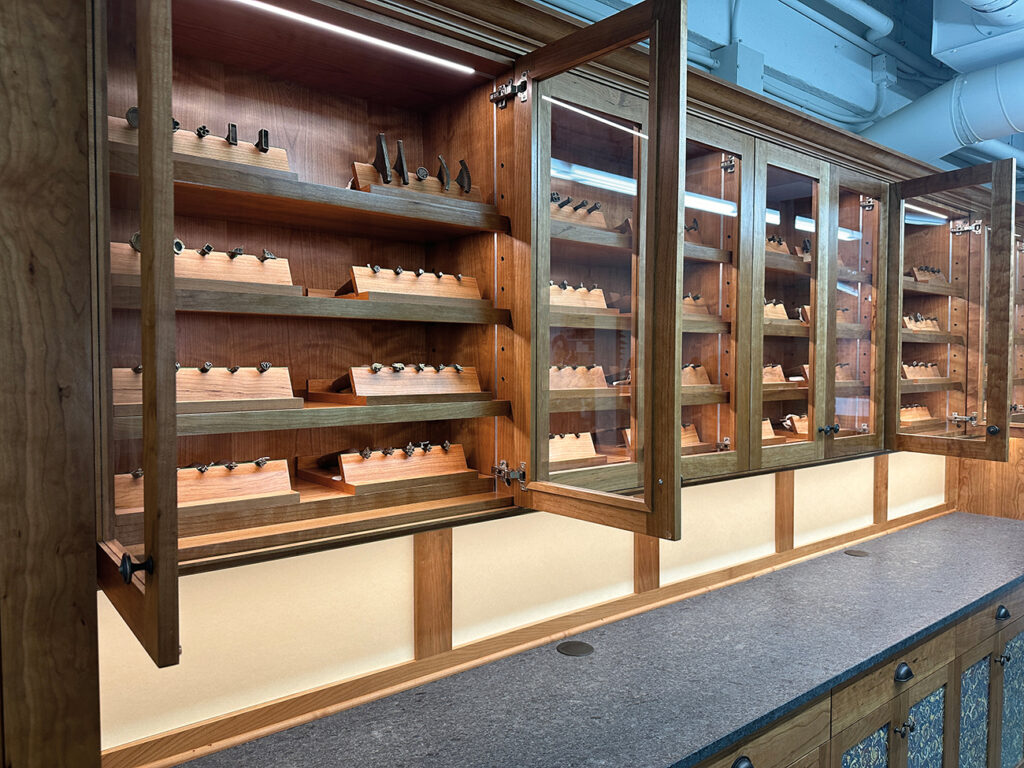 Display cabinets of donated historic bookbinding tools