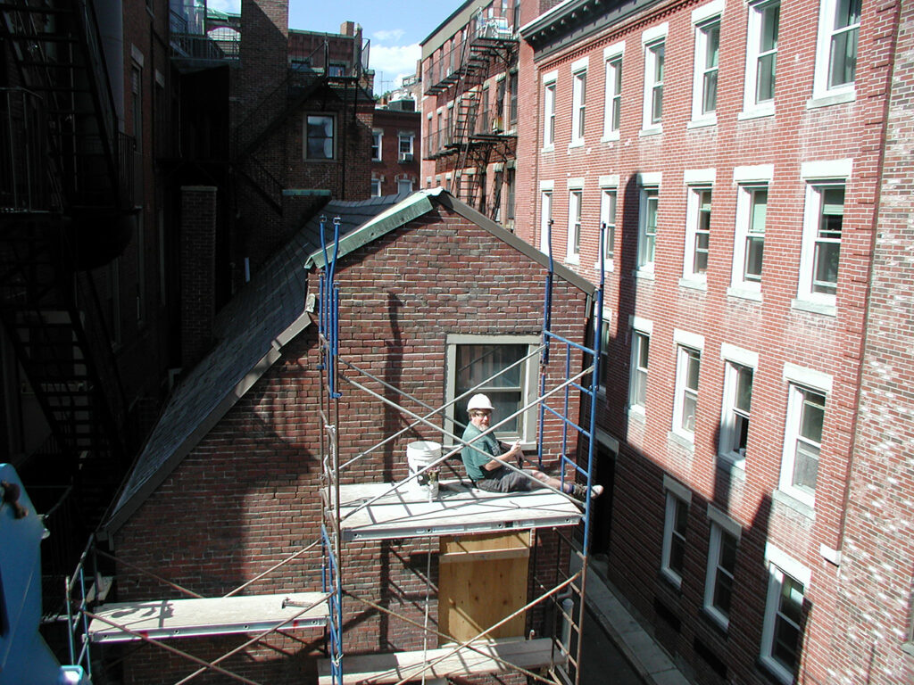 Working on the Shaw House of the original NBSS building in September 2003