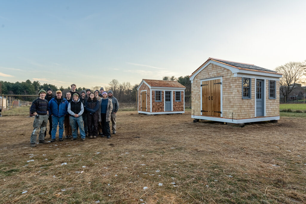 Sheds made by first-year Preservation Carpentry students at Brookwood Farm in December 2025